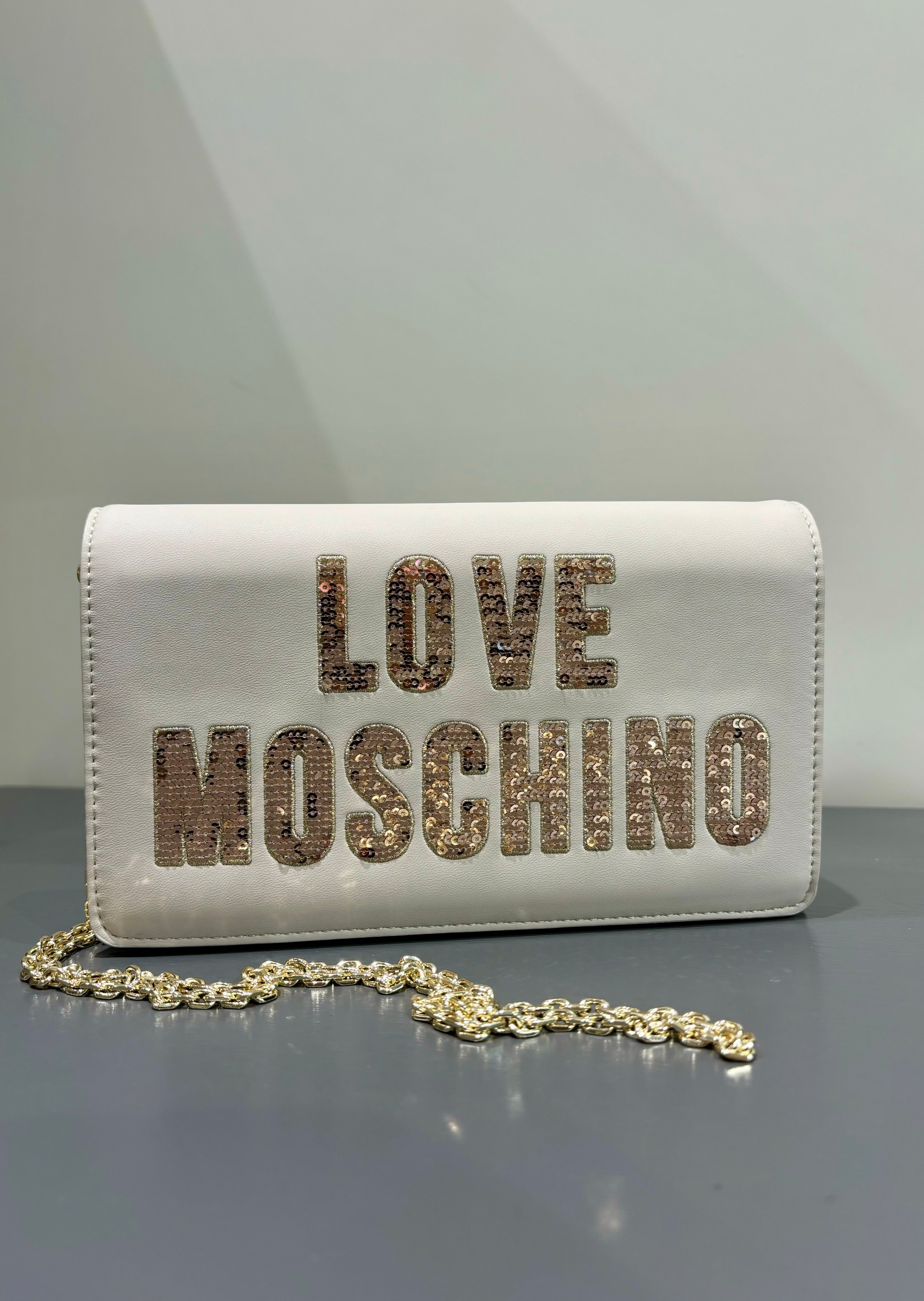 Clutch con patta e paillettes