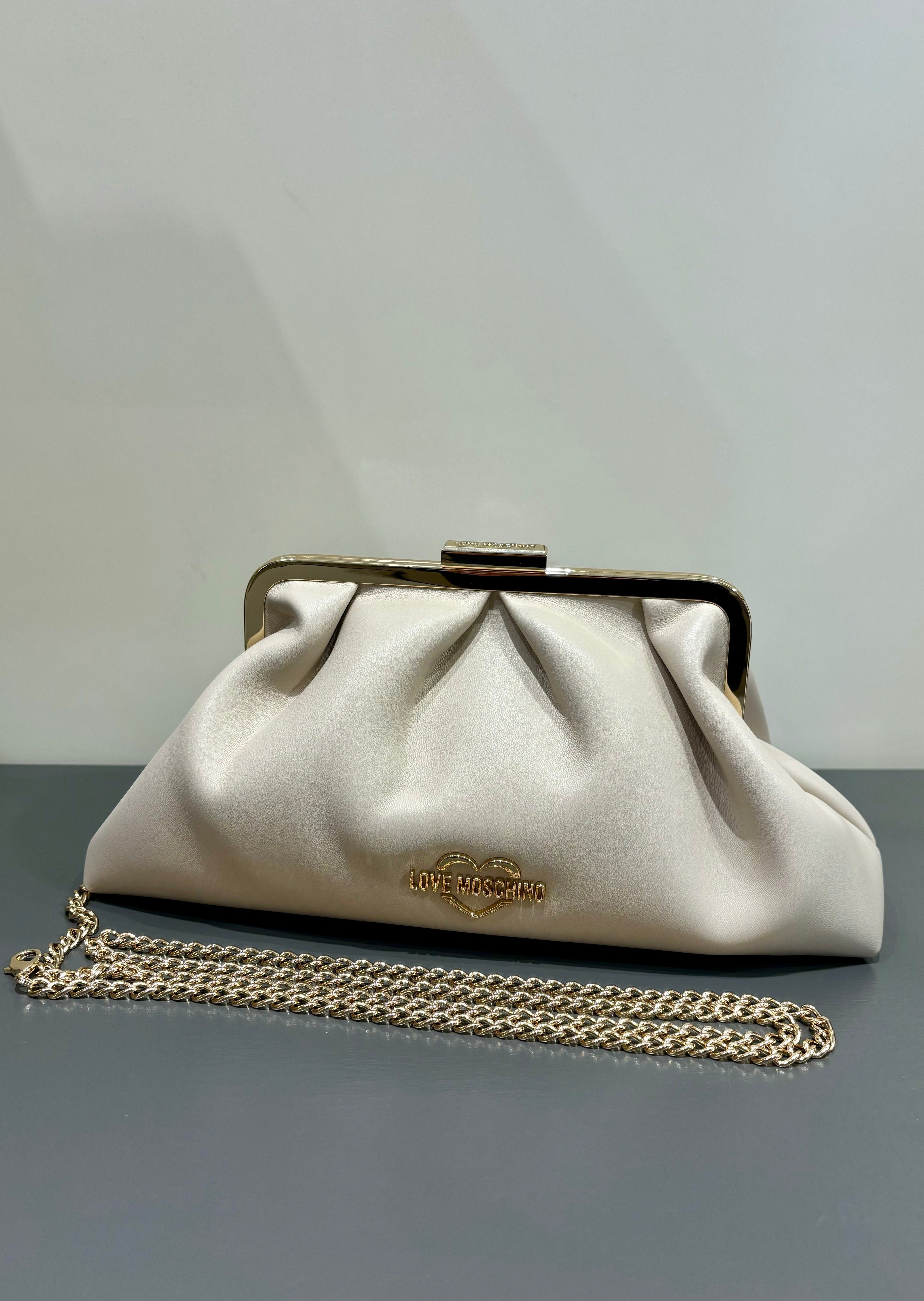 Pochette con chiusura in metallo