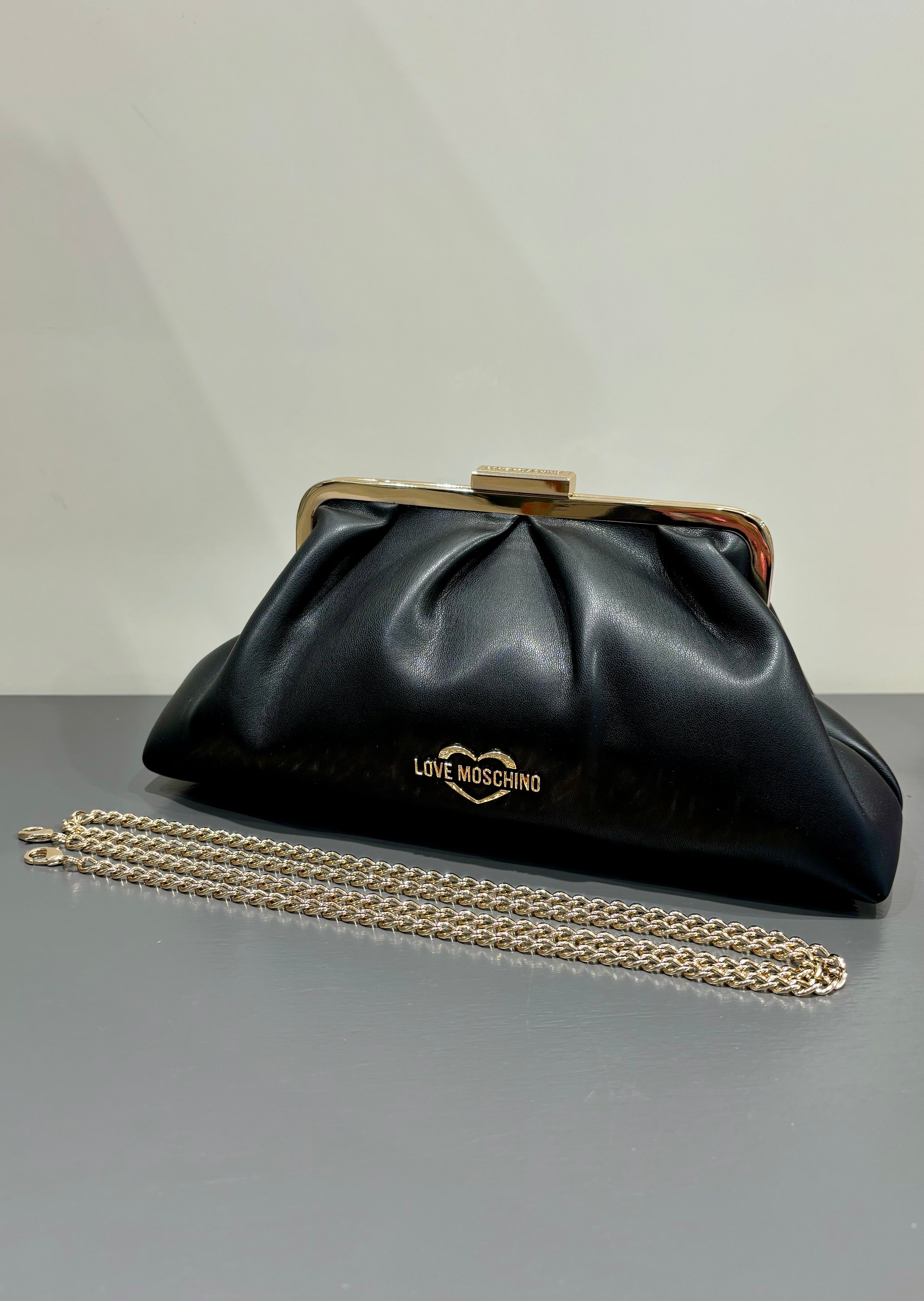 Pochette con chiusura in metallo