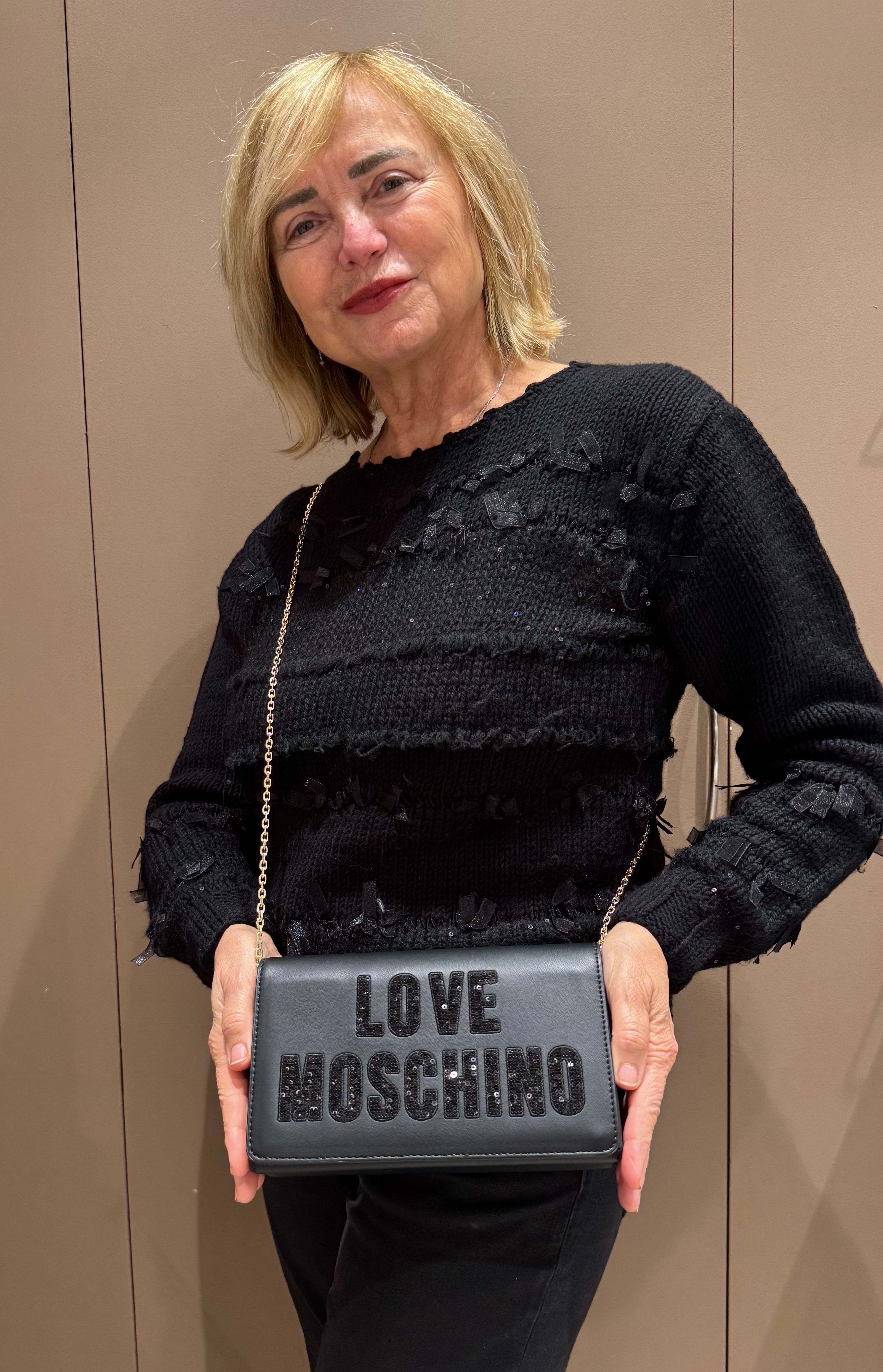 Clutch con patta e paillettes LOVE MOSCHINO